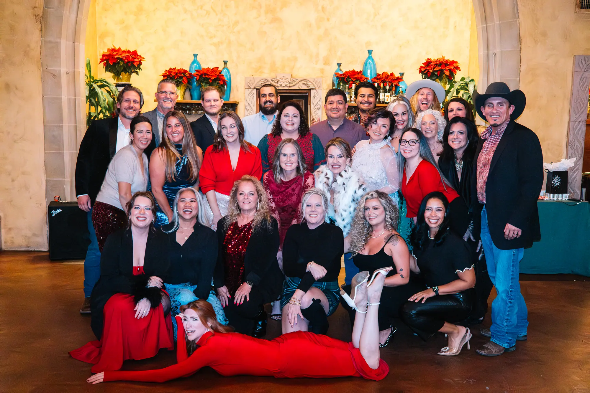 The 6th Ave Homes team together at a holiday party.