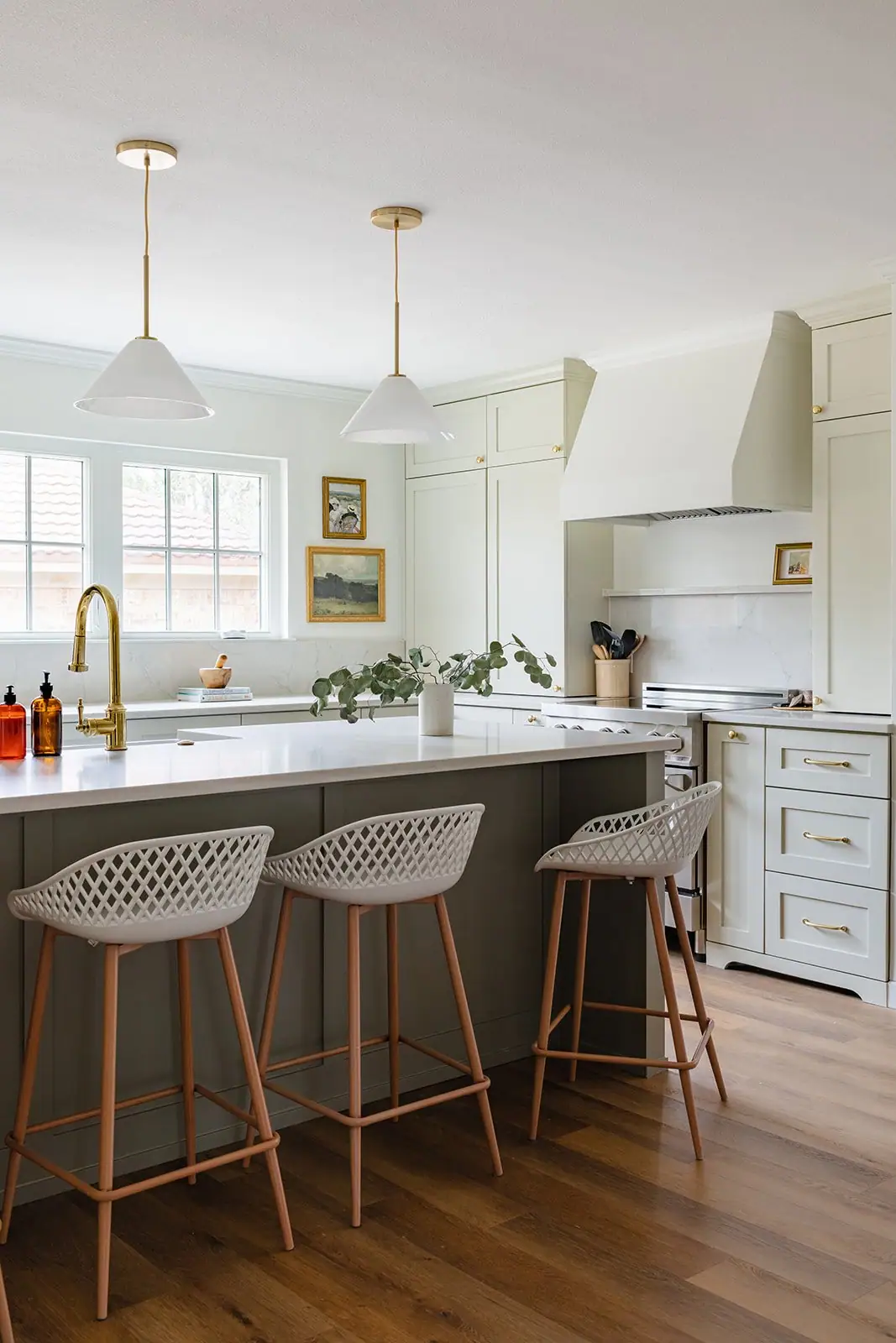 Sage-and-marble kitchen, interior design by 6th Ave Homes in Fort Worth