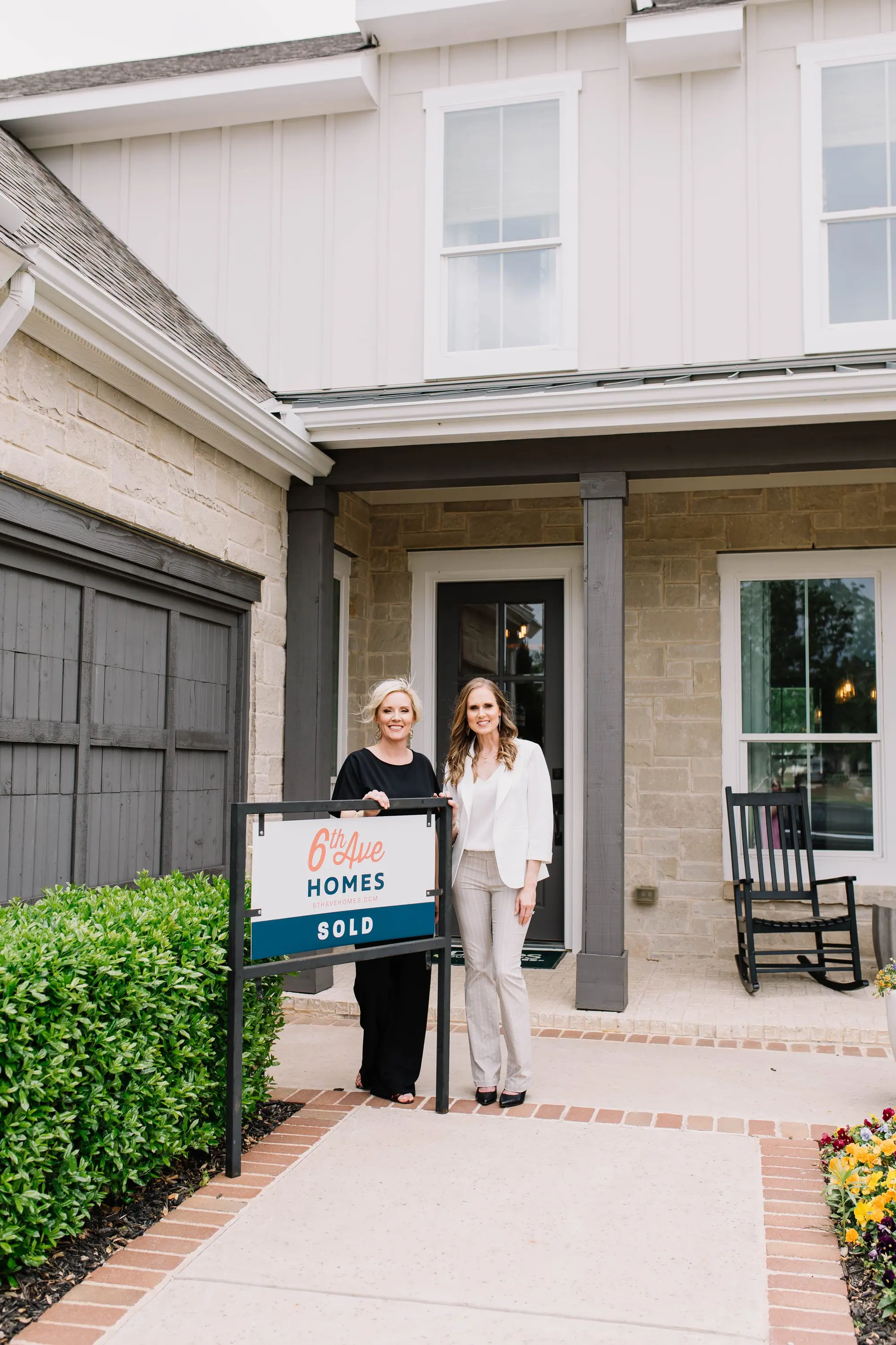 6th Ave Homes sellers with a Sold sign