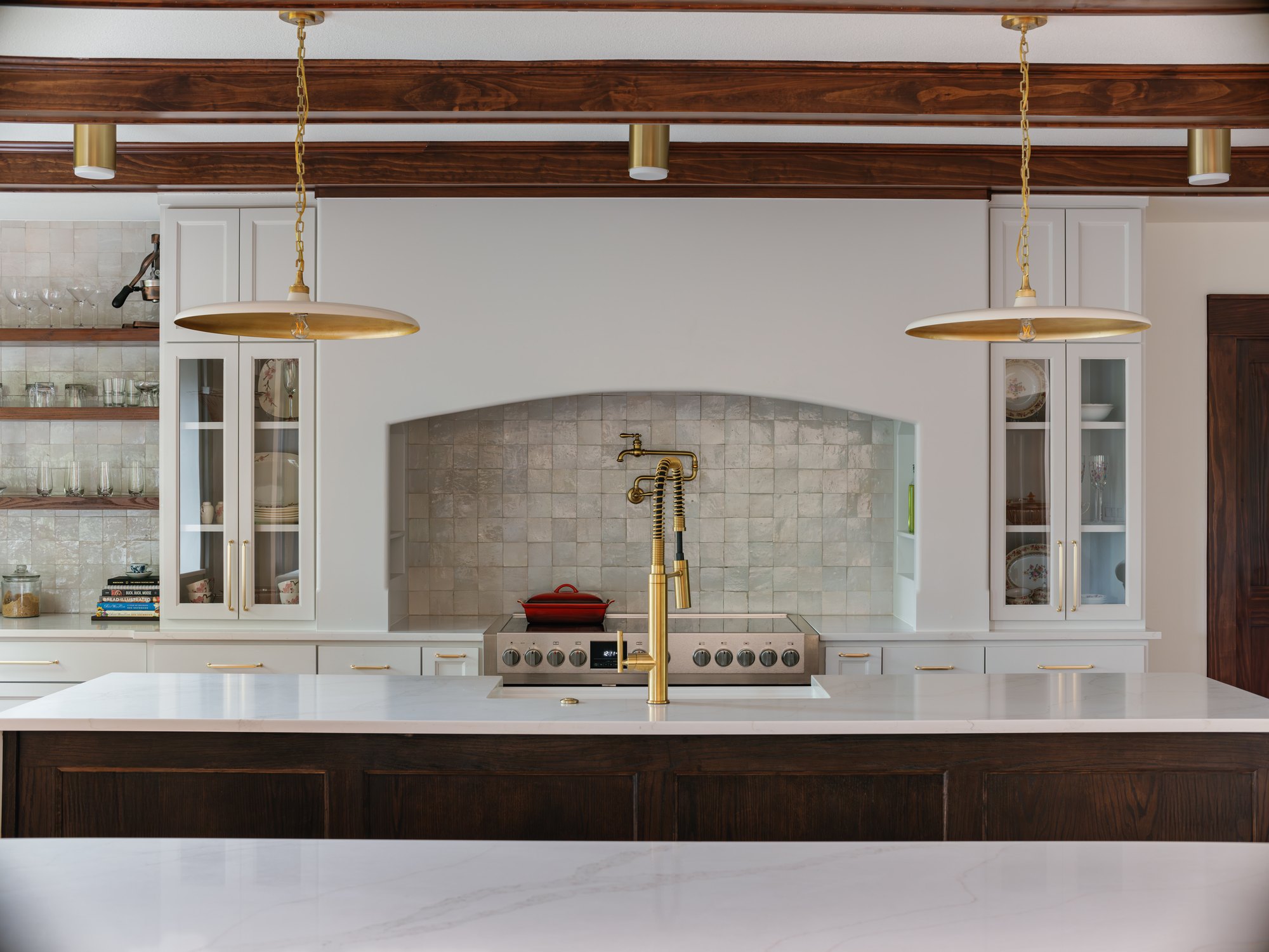A Ryan Place kitchen under walnut ceiling beams, added as part of a 1,700 square foot historic expansion