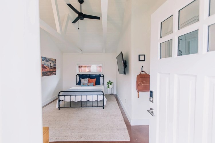 A converted garage space finished as a comfortable guest suite