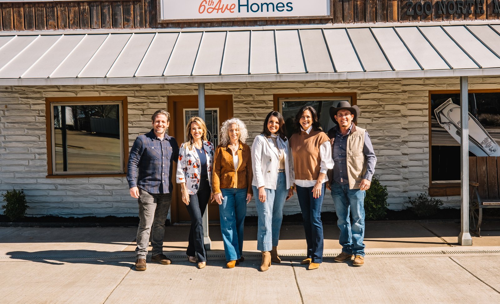 The 6th Ave Homes team outside the Mansfield office on North Main Street
