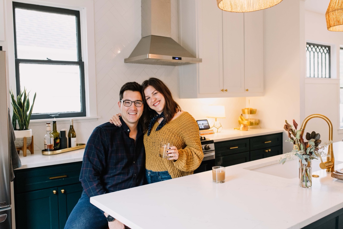A couple relaxed together in a bright, modern Fort Worth kitchen