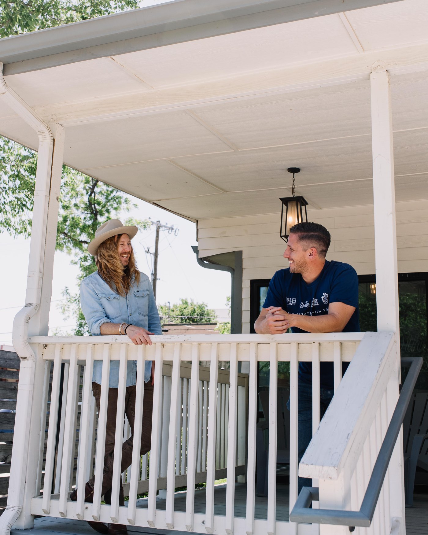 Jamey Ice and Jimmy Williams, the two founders of 6th Ave Homes, on a Fort Worth craftsman porch