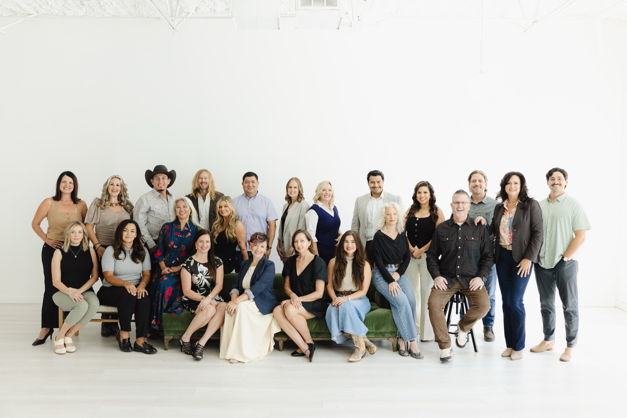The full 6th Ave Homes team, all together in the studio