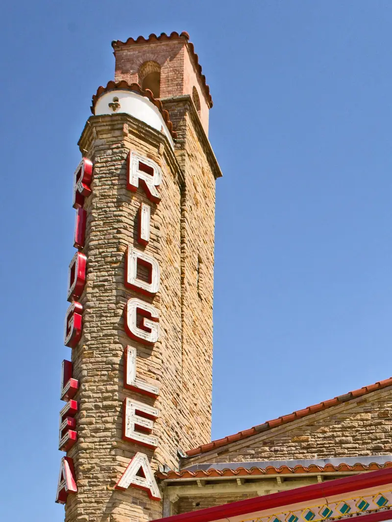 The Ridglea Theater’s tower on Camp Bowie Boulevard, with its name in tall red and white letters.